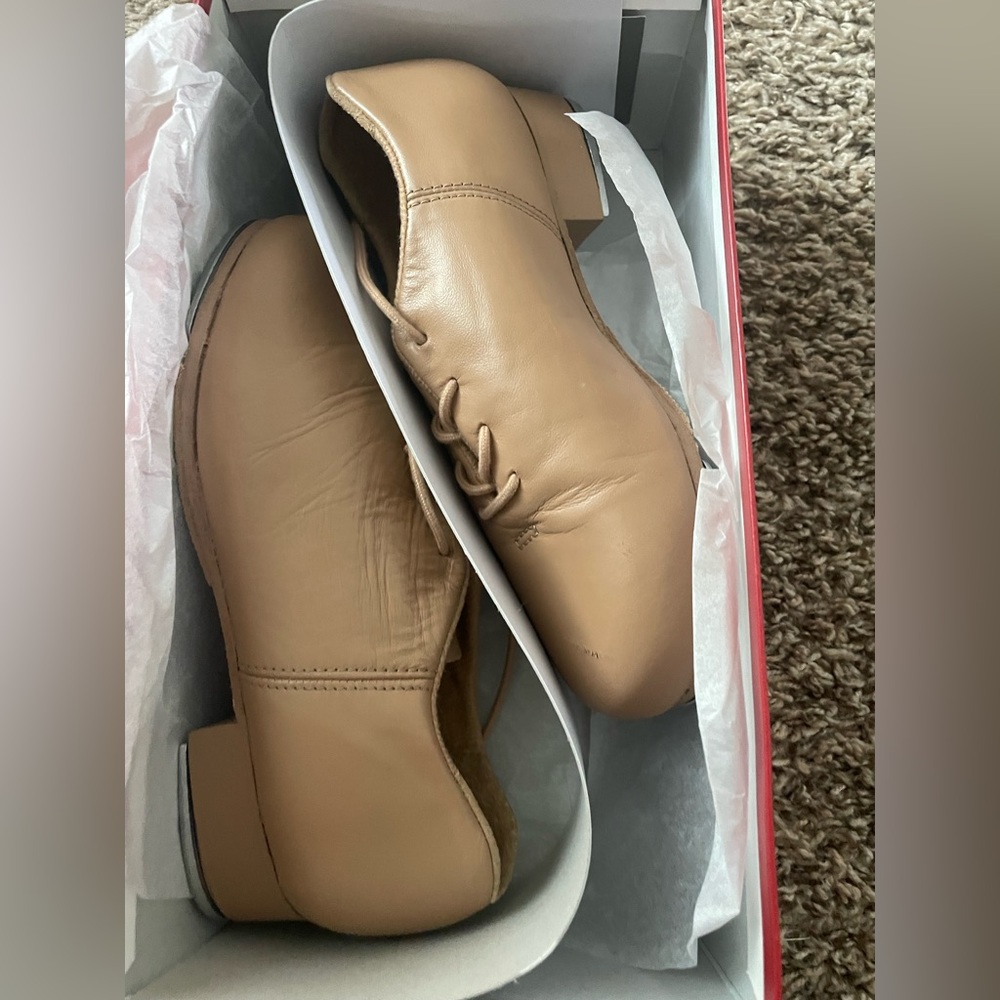 Capezio tan tap shoes size 5. Worn 1 time.